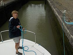 becky handles the lines at the first lock
